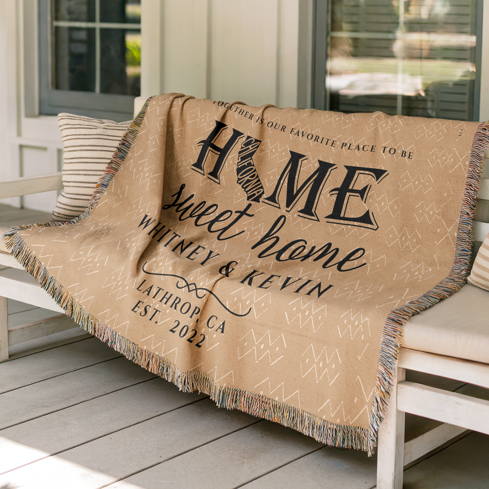 Boho personalized woven Beige blanket with 'Home sweet home' text on a white porch bench outdoors. Available at FunLifeNow.com