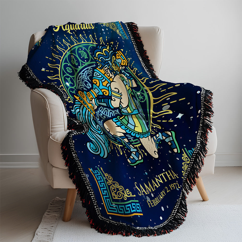 Decorative blanket with astrological design draped over a chair.