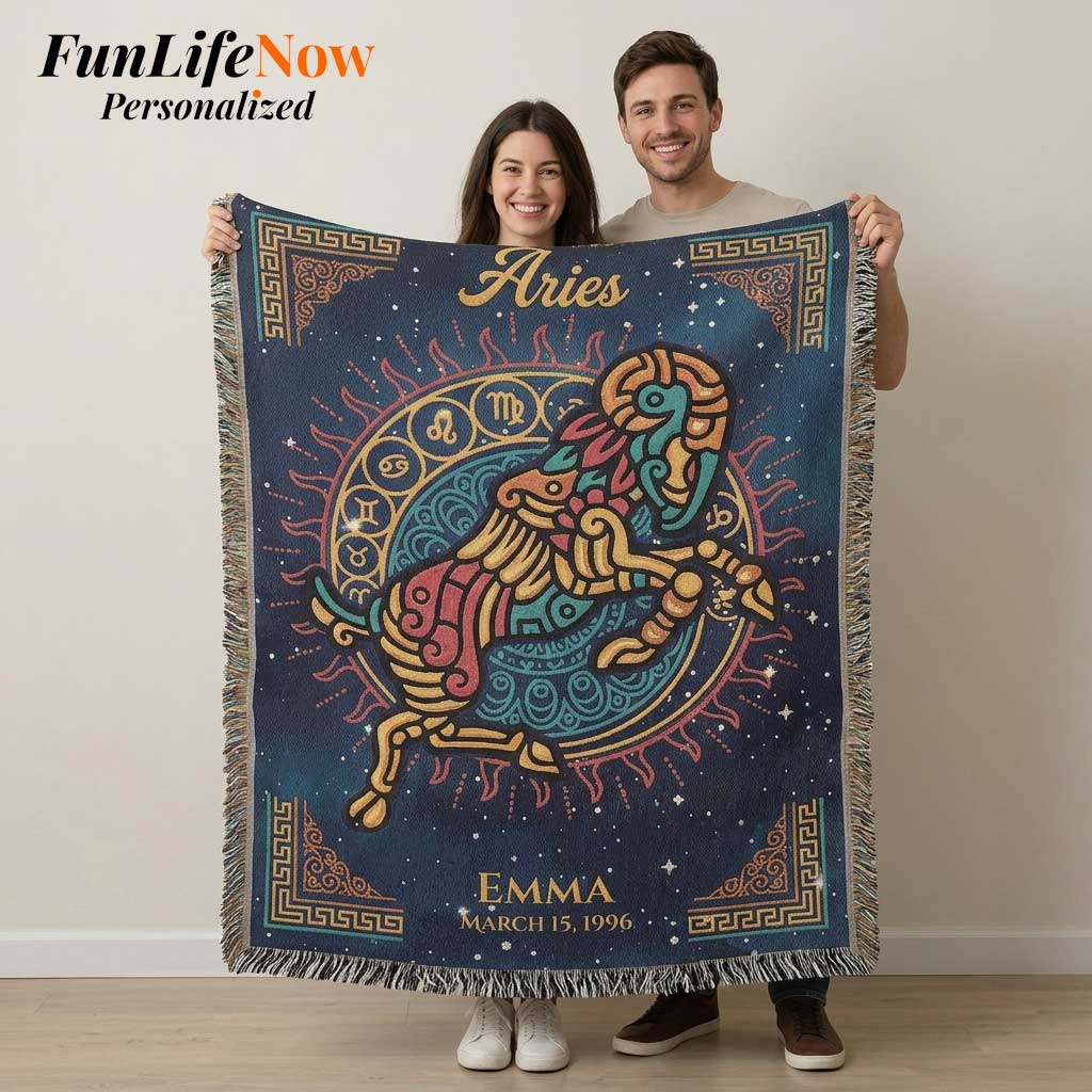 Two people holding a colorful 'Aries' themed blanket with star design.