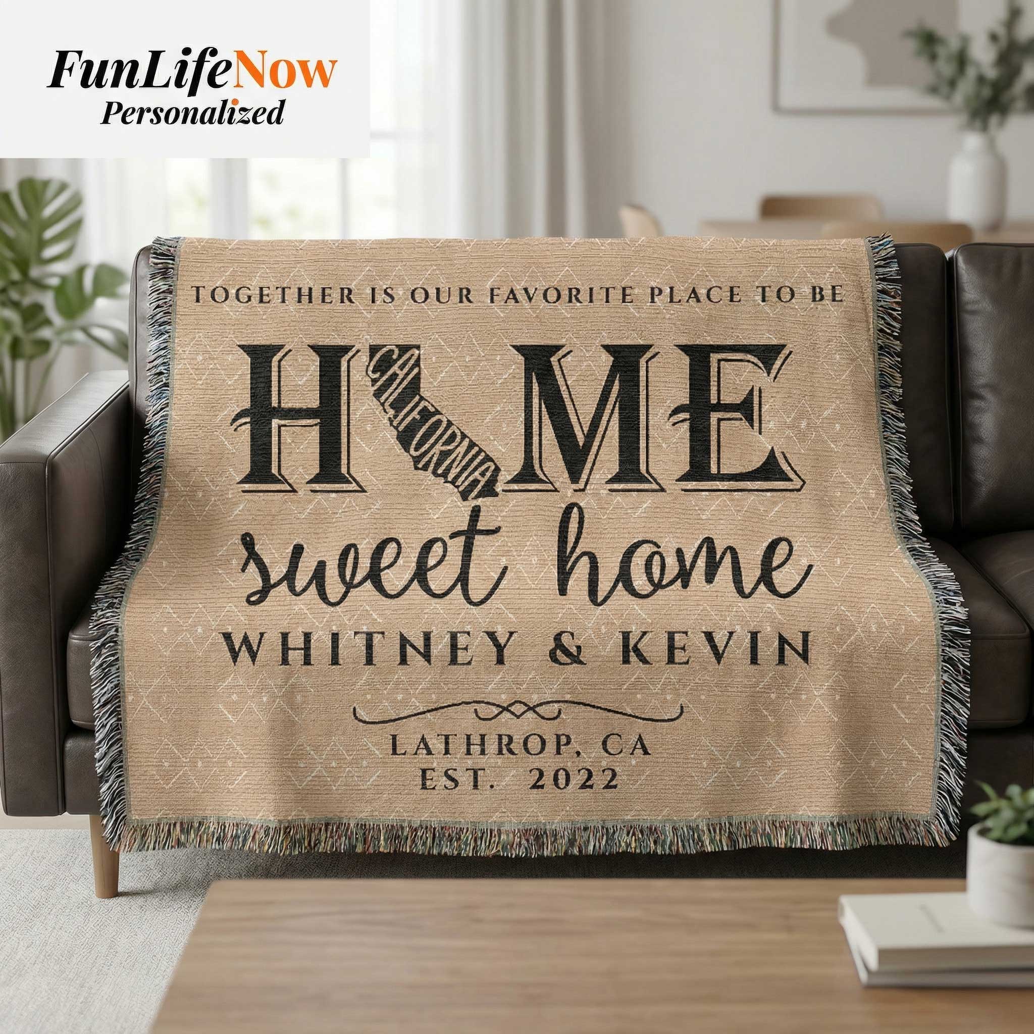 Personalized California blanket with 'Home sweet home' text on a couch in a living room. Custom blanket available at funlifenow.com