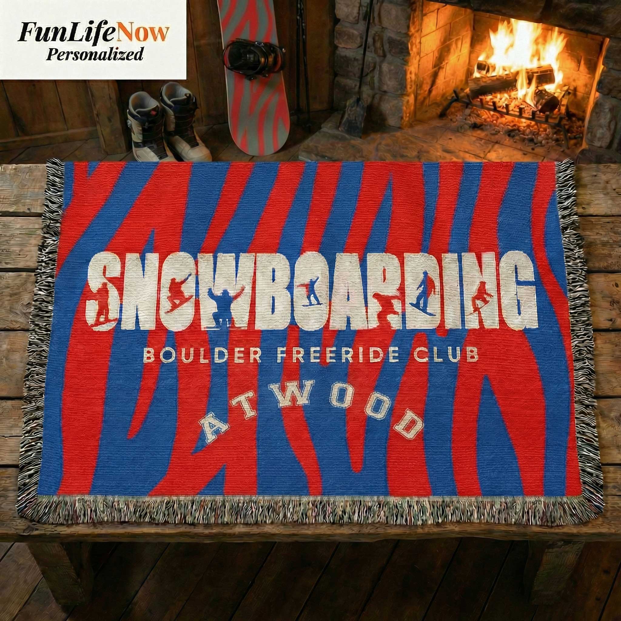 Personalized Blanket with 'Snowboarding Boulder Freeride Club' text in front of a fireplace. Custom blanket available at Funlifenow.com