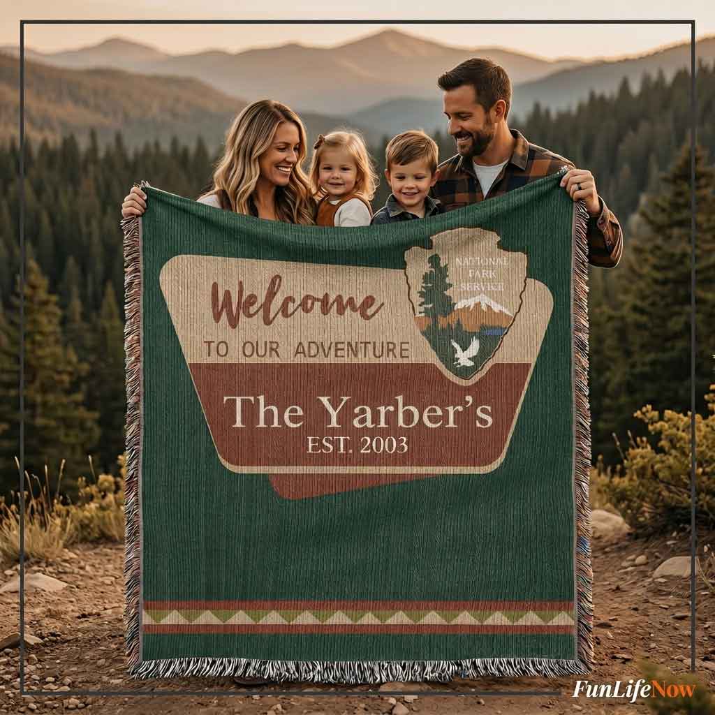 Family holding a blanket with 'Welcome to our adventure' and family name on a scenic background