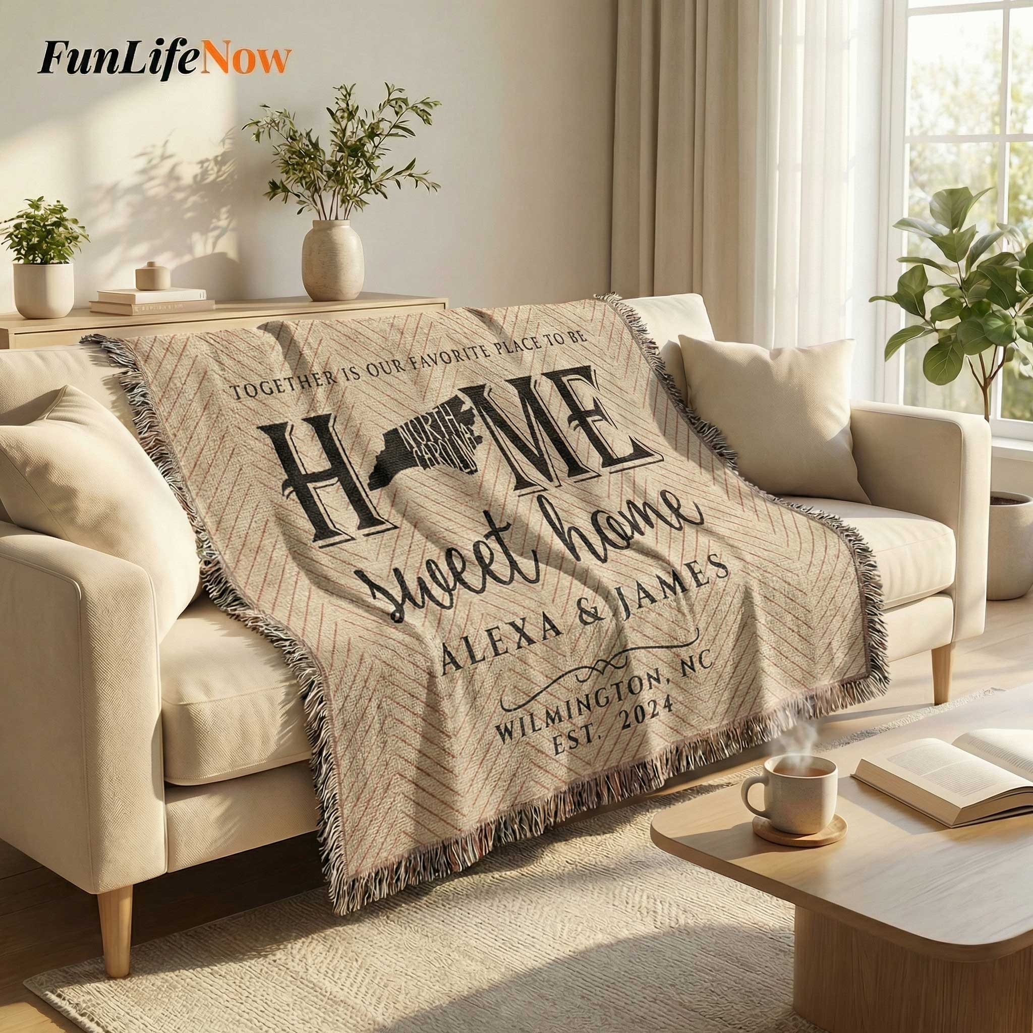 Personalized 'Home sweet home' throw blanket on a couch in a cozy living room.