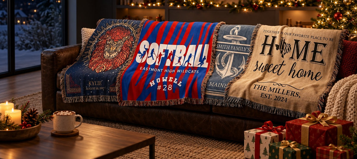 Personalized woven blankets on a sofa in a cozy Christmas living room with wrapped gifts