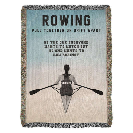 A personalized woven blanket with a graphic of a female rower on the water and the text 'ROWING PULL TOGETHER OR DRIFT APART BE THE ONE EVERYONE WANTS TO WATCH BUT NO ONE WANTS TO ROW AGAINST'. Name on back of jersey is customizable. 