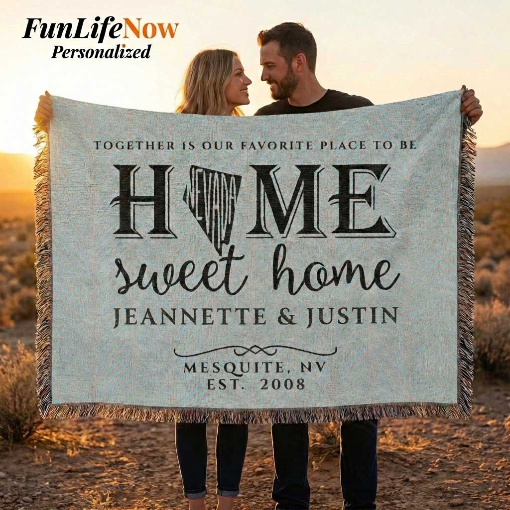Two people holding a Nevada State blanket with personalized text in a desert setting. Blanket available at funlifenow.com
