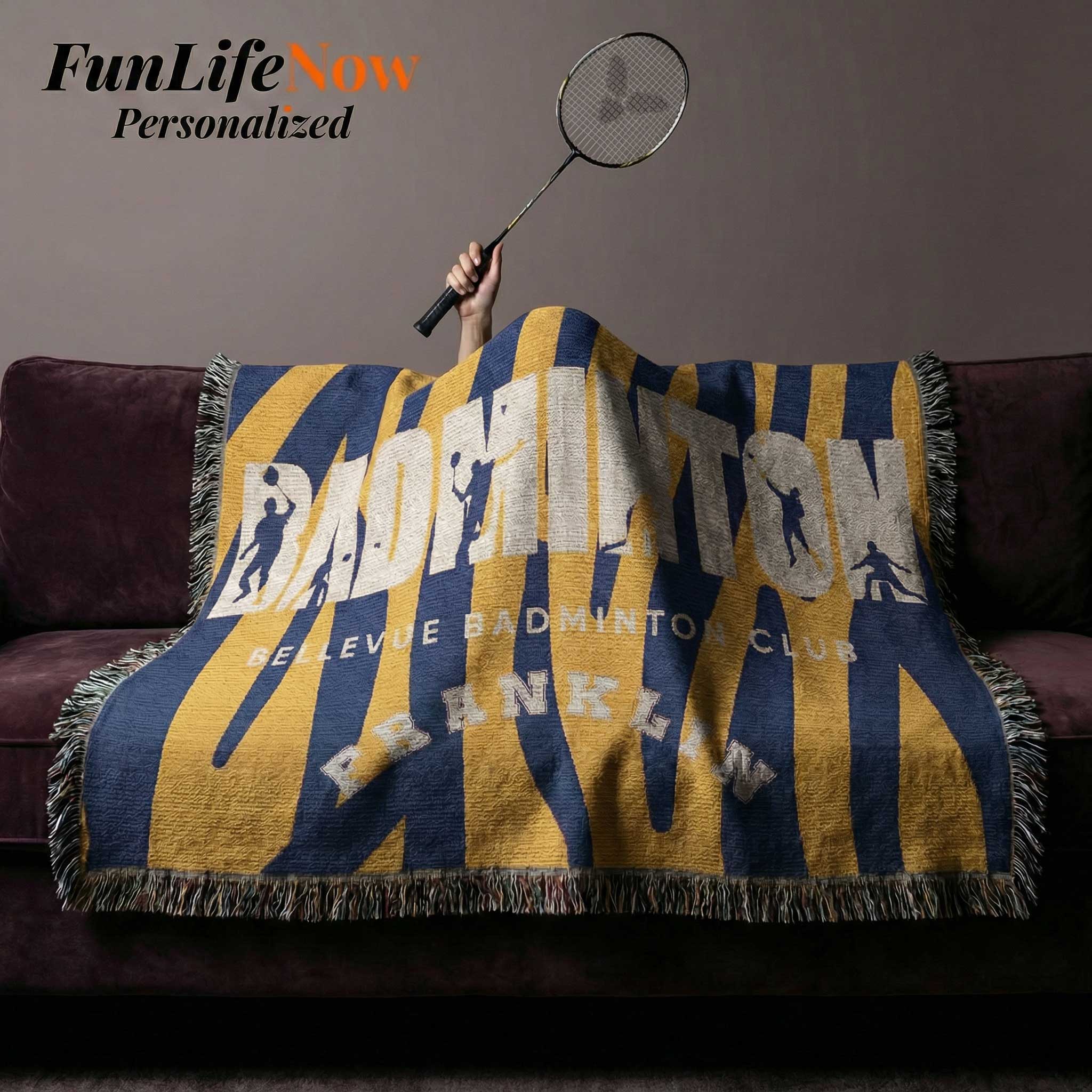 Badminton-themed blanket with purple and yellow stripes on a couch in a living room. Blanket throw available at funlifenow.com