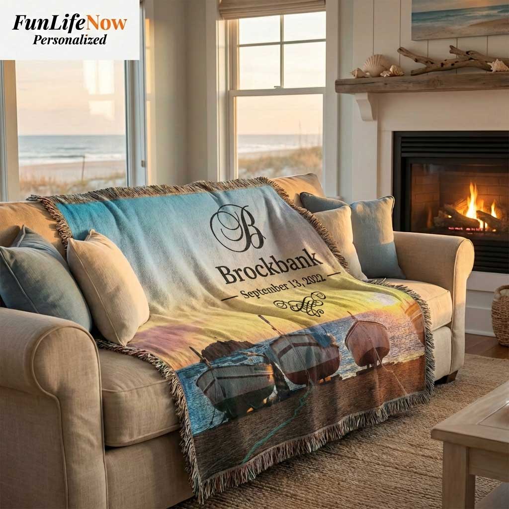 Person holding a personalized nautical boating blanket with a sunset and boats design, featuring the name 'Anderson' and date. Custom blanket is available at funlifenow.com