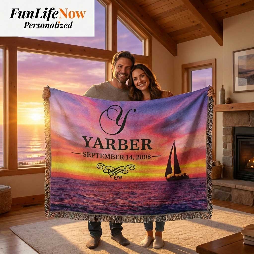 Couple holding a personalized nautical boating blanket with sunset design and custom monogramed name and date being held in a cozy room. Custom blanket is available at funlifenow.com