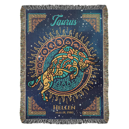 A personalized woven blanket with a Taurus zodiac sign design, featuring a bull, and personalized text including the name 'HELEN' and the dates 'April 20, 1990'.
