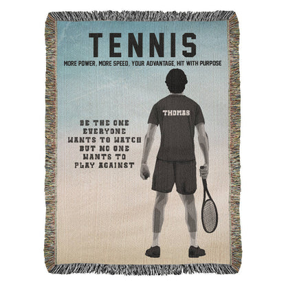A woven blanket with a tennis theme, featuring a silhouette of a tennis player and the text 'TEennis more power, more speed, your advantage. Hit with purpose' along with the name 'Thomas' on the player's shirt.